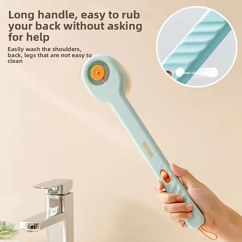 Handheld scrubber with long handle held by a hand, next to a faucet on a beige background.